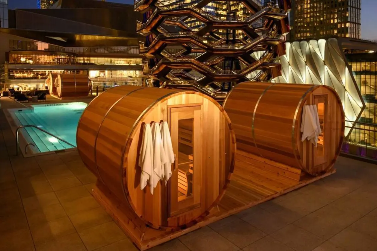 Outdoor pool + barrel saunas at Equinox Hotel NYC
